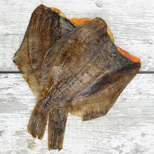 Камбала морская обезглавленная потрошенная с икрой 1 кг
